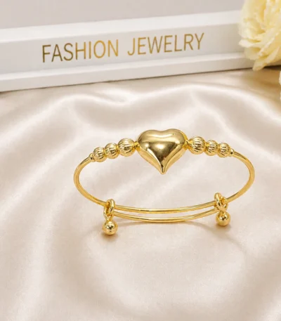Gold heart charm bracelet Pakistan — adjustable puffy heart beaded cuff bangle by LumiraPK