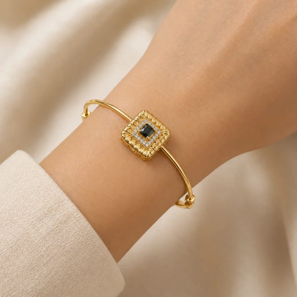 Gold evil eye bracelet Pakistan with crystal square centerpiece