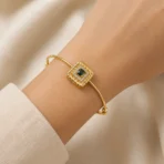 Gold evil eye bracelet Pakistan with crystal square centerpiece