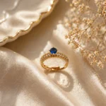 Alluring blue stone adjustable ring Pakistan with gold-plated pavé band