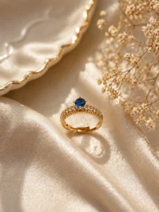 Alluring blue stone adjustable ring Pakistan with gold-plated pavé band