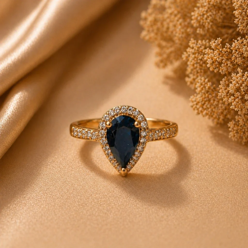 blue stone ring Pakistan with elegant gold zircon design