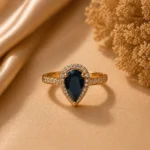 blue stone ring Pakistan with elegant gold zircon design