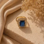 Blue sapphire halo ring Pakistan — adjustable emerald-cut CZ rectangular gold ring by LumiraPK