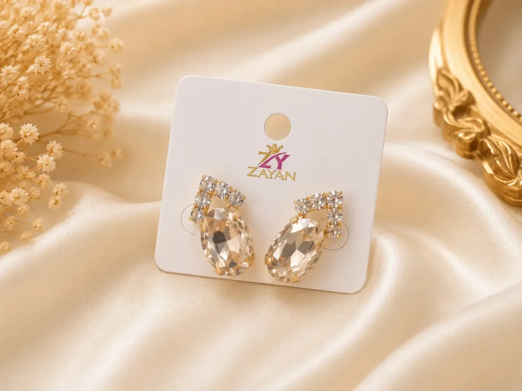 Crystal earrings Pakistan with oval stone party wear design