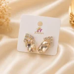 Crystal earrings Pakistan with oval stone party wear design