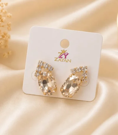 Crystal earrings Pakistan with oval stone party wear design