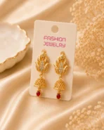 Front view of beautiful gold plated Kundan Drop Earrings by Lumira PK.