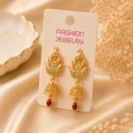 Front view of beautiful gold plated Kundan Drop Earrings by Lumira PK.