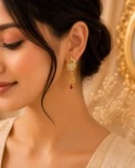 Detailed close-up of artificial Kundan Drop Earrings stones.