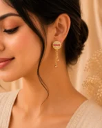 Gold Tassel Earrings Pakistan with pink stone detailing and lightweight chain drop party wear design by Lumira PK