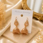 Gold jhumki earrings Pakistan with traditional mehndi style design