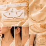 Gold-tone crystal necklace and matching stud earrings displayed on cream satin background
