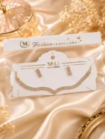 Close-up collage showing crystal necklace curve design, earrings, clasp, and adjustable chain