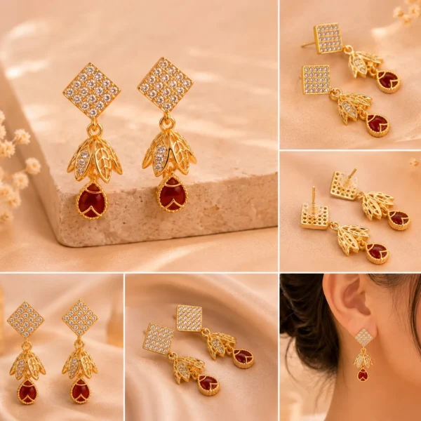 Crystal leaf earrings with ruby red drop stone detailing