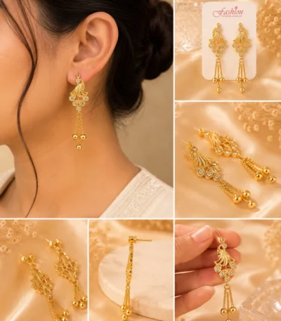 Woman wearing elegant golden crystal tassel earrings