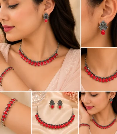 Woman wearing silver-tone red stone ethnic necklace set