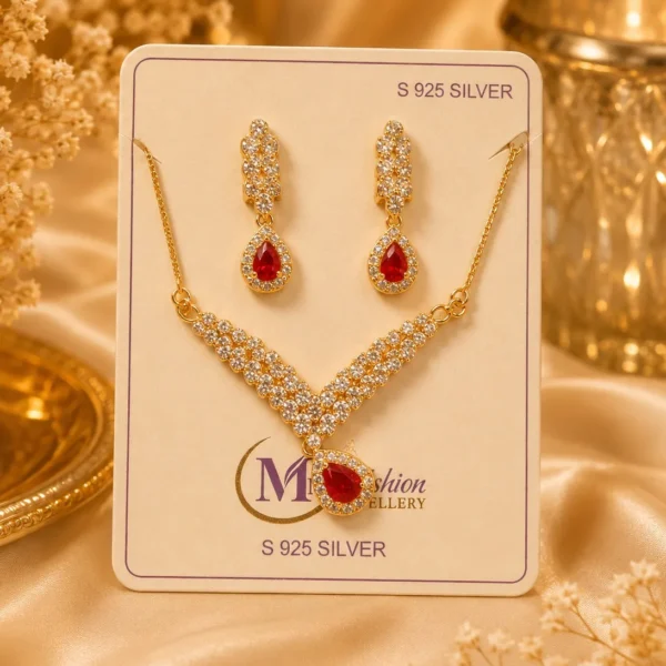 Red crystal necklace set with matching earrings displayed on jewelry card