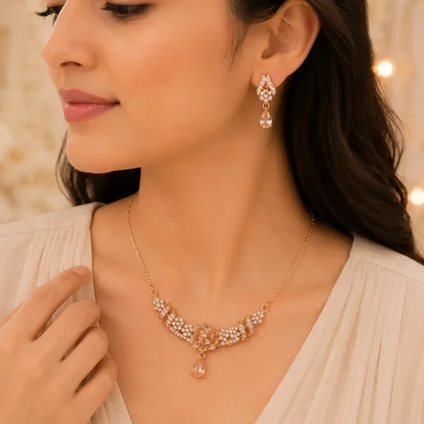 Woman wearing rose gold floral crystal necklace with matching earrings