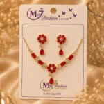 Ruby red floral crystal necklace set displayed on jewelry card
