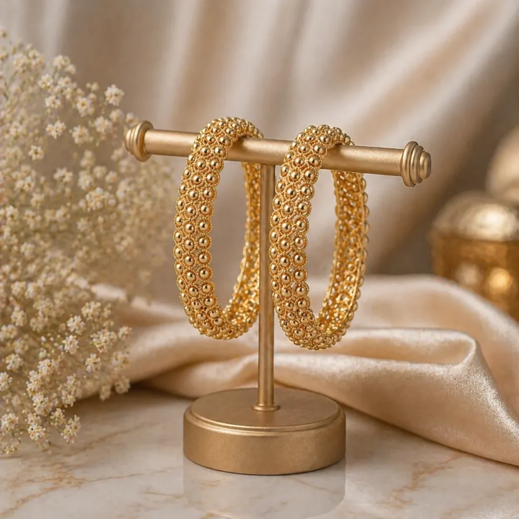 Textured gold hoop bangles Pakistan with elegant luxe detailing