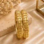 Gold plated geometric bangles Pakistan pair with engraved block pattern