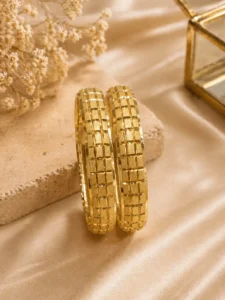 Gold plated geometric bangles Pakistan pair with engraved block pattern