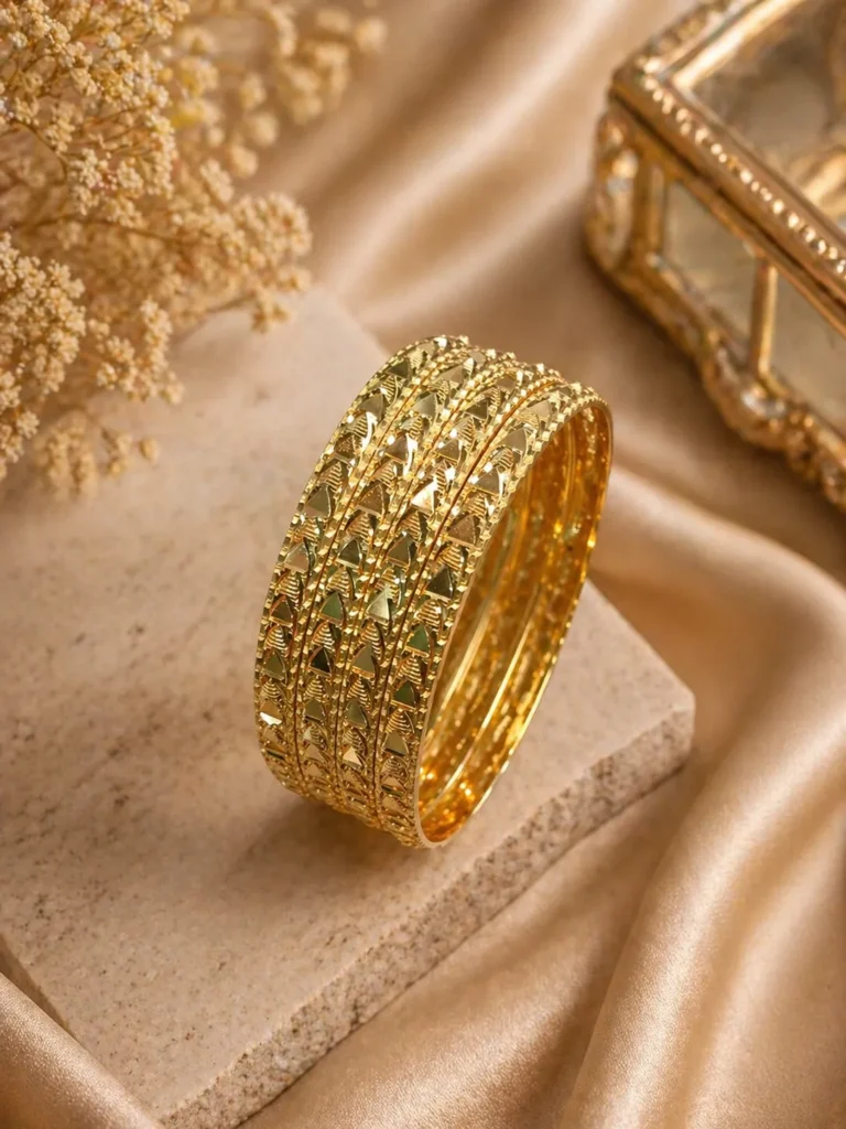 Gold engraved bangles set Pakistan with traditional textured detailing