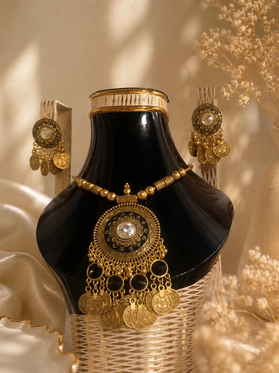 black-antique-necklace-set-pakistan-lumira-pk.webp Black antique necklace set Pakistan featuring vintage coin charms, black stone detailing, and matching earrings by Lumira PK