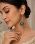 Silver oxidized long jhumka earrings for women with antique floral design and hanging beads for Pakistani ethnic wear