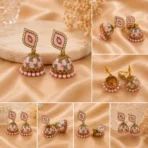 Pink meenakari jhumka earrings with crystal accents and bead drops for festive wear in Pakistan by Lumira PK