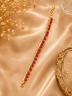 Ruby crystal anklet with red bead accents and sparkling crystal stones on a gold-tone chain by Lumira PK Pakistan