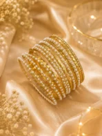 Pearl bangle set with gold-tone finish and layered pearl detailing for women in Pakistan by Lumira PK