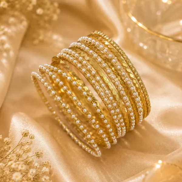 Pearl bangle set with gold-tone finish and layered pearl detailing for women in Pakistan by Lumira PK