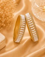 Pearl beaded bangles set Pakistan featuring white beadwork, crystal accents, and gold-tone detailing by Lumira PK